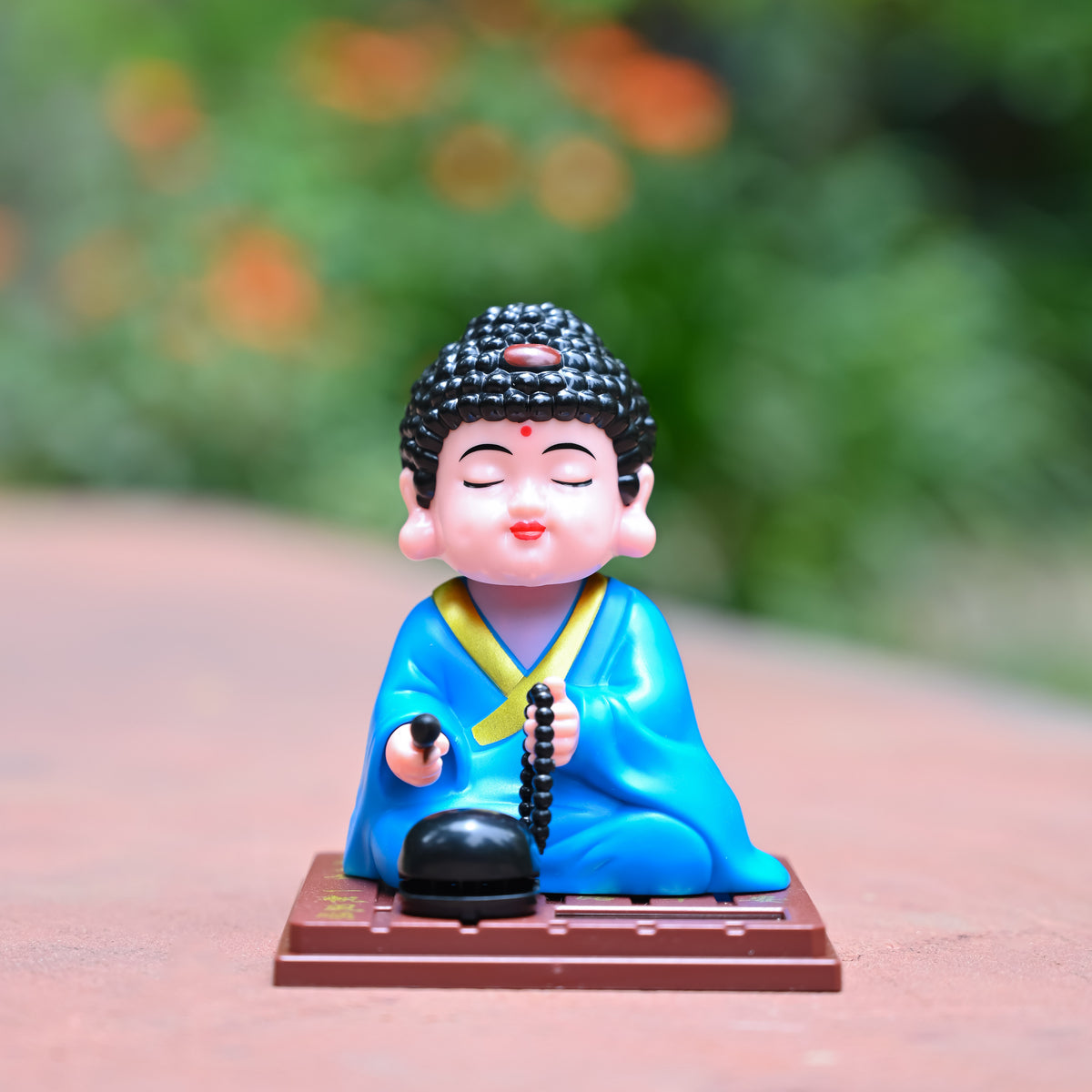 HindCraft Solar-Powered Blue Meditating Monk Showpiece with Prayer Beads and Bell for Home, Office & Car Dashboard Décor
